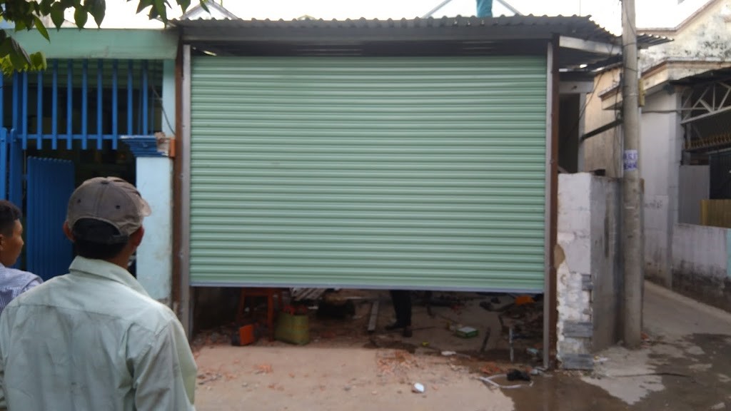 sửa cửa cuốn quận tân phú